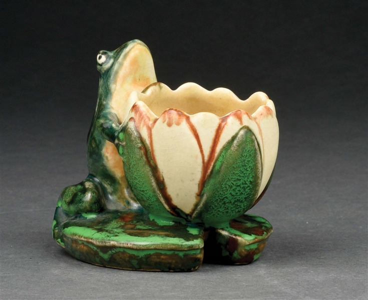 WELLER POTTERY "COPPERTONE" FROG EMBRACING A LOTUS FLOWER.