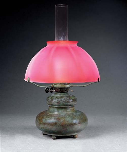 TIFFANY STUDIOS OIL LAMP W/PINK FAVRILE SHADE.