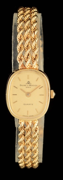 LADIES’ 14K GOLD BAUME & MERCIER QUARTZ WRIST WATCH.