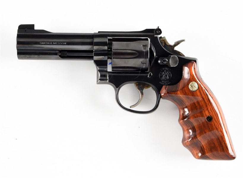 (M) SMITH & WESSON MODEL 16-4 DOUBLE ACTION REVOLVER.