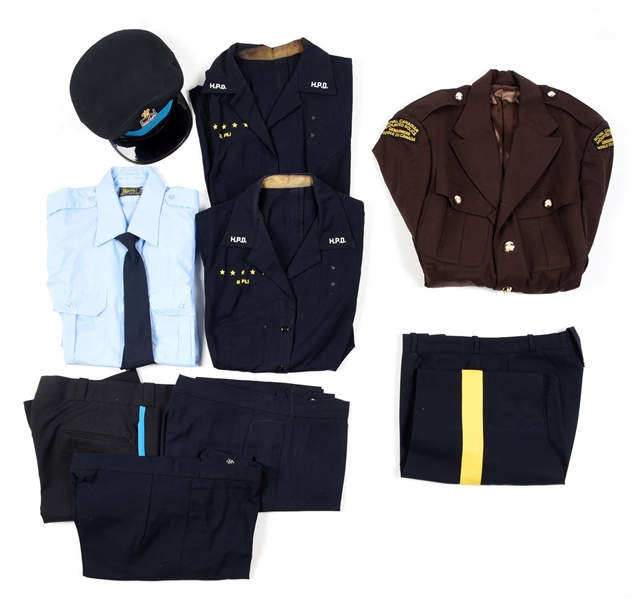 LOT OF CANADIAN POLICE UNIFORMS PIECES.