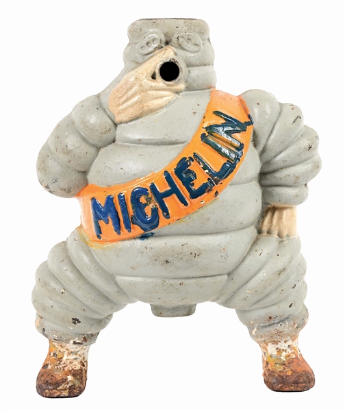 CAST IRON MICHELIN MAN FIGURAL DISPLAY.