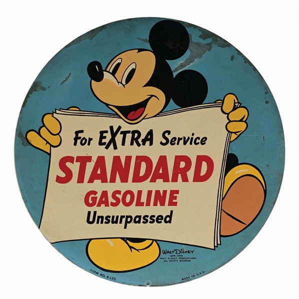STANDARD GASOLINE TIN SPARE TIRE COVER SIGN W/ MICKEY MOUSE GRAPHIC. 