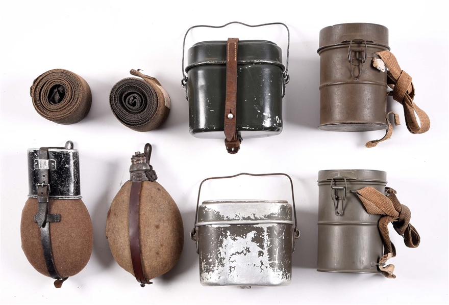 LOT OF GERMAN WWI-WWII MESS KITS, CANTEENS, AND GAS MASKS.