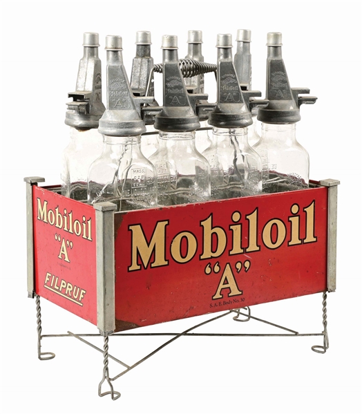 MOBILOIL "A" FILPRUF MOTOR OILS SERVICE STATION RACK COMPLETE W/ EIGHT "FILPRUF" BOTTLES. 