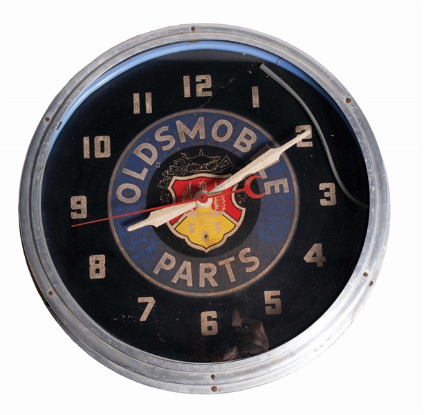 OLDSMOBILE PARTS NEON ADVERTISING CLOCK. 