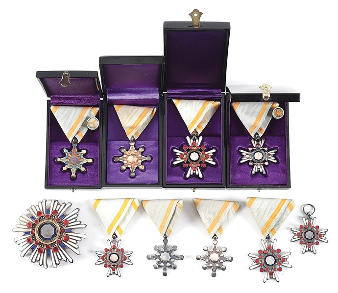 LOT OF JAPANESE ORDER OF THE SACRED TREASURE MEDALS.