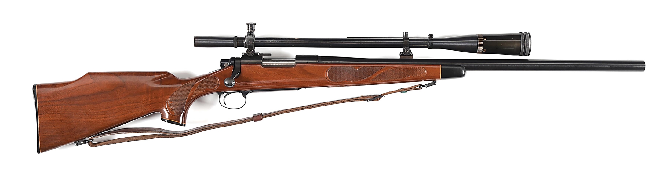 (C) REMINGTON MODEL 700 VARMINT SPECIAL BOLT ACTION RIFLE IN .222 WITH LYMAN OPTIC.