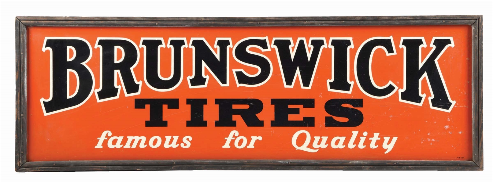 BRUNSWICK TIRES "FAMOUS FOR QUALITY" SELF FRAMED TIN SIGN.