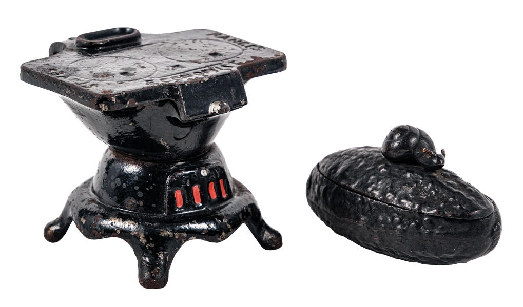 A PAIR OF CAST IRON MATCH HOLDERS