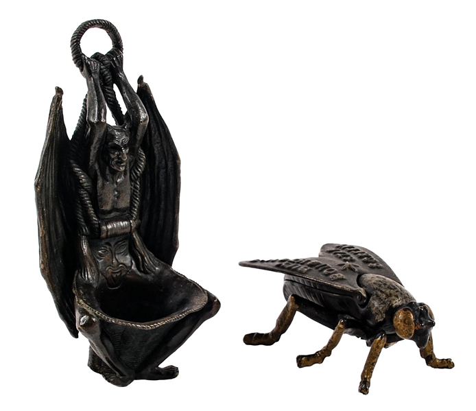 A PAIR OF BRONZE FIGURAL MATCH HOLDERS