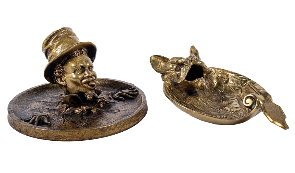 A PAIR OF FIGURAL BRONZE ASHTRAYS & MATCH HOLDERS