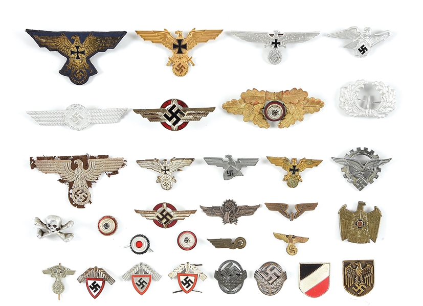 LOT OF MISCELLANEOUS THIRD REICH CAP INSIGNIA.