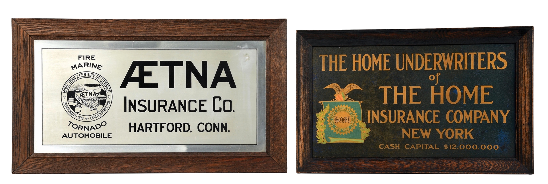 COLLECTION OF 2: METAL INSURANCE SIGNS W/ WOOD FRAMES.