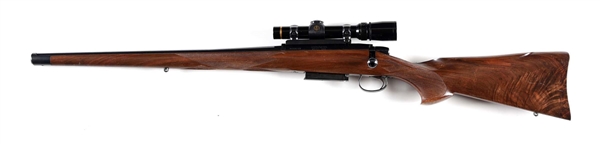 (M) CUSTOM MANNLICHER STOCKED REMINGTON MODEL 788 LH BOLT ACTION RIFLE WITH LEUPOLD SCOPE.