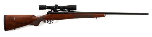 (M) BOXED LEFT HANDED WINCHESTER MODEL 70 CLASSIC SPORTER BOLT ACTION RIFLE.