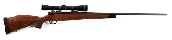 (M) LEFT HANDED WEATHERBY MARK V BOLT ACTION RIFLE WITH LEUPOLD OPTIC.