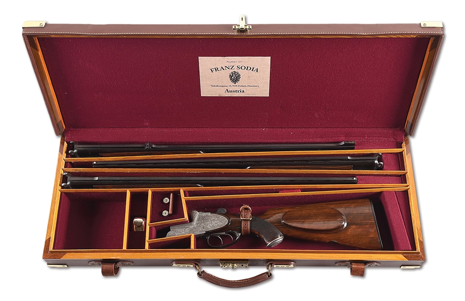 (C) FRANZ SODIA FULLY ENGRAVED OVER UNDER GAME GUN SET, WITH 28 AND .410 SHOTGUN BARRELS AND .30-06 DOUBLE RIFLE BARRELS. 