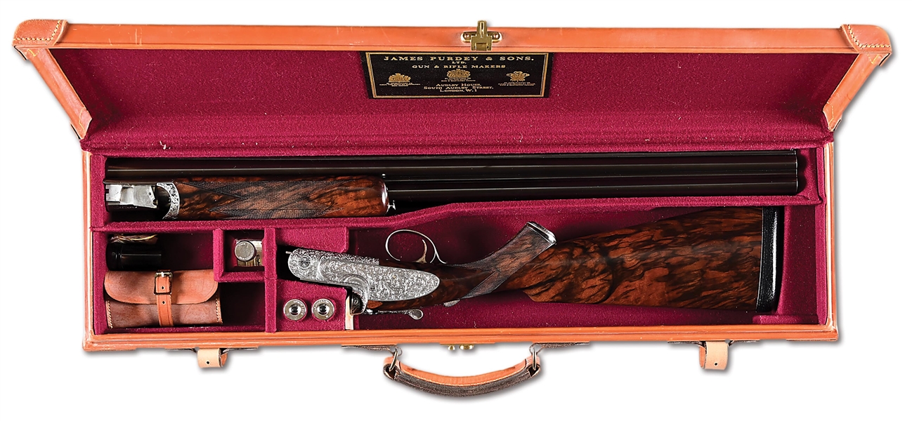 (M) EXQUISITE STEVE KELLY ENGRAVED JAMES PURDEY & SONS 12 GAUGE OVER/UNDER SHOTGUN WITH CASE. 