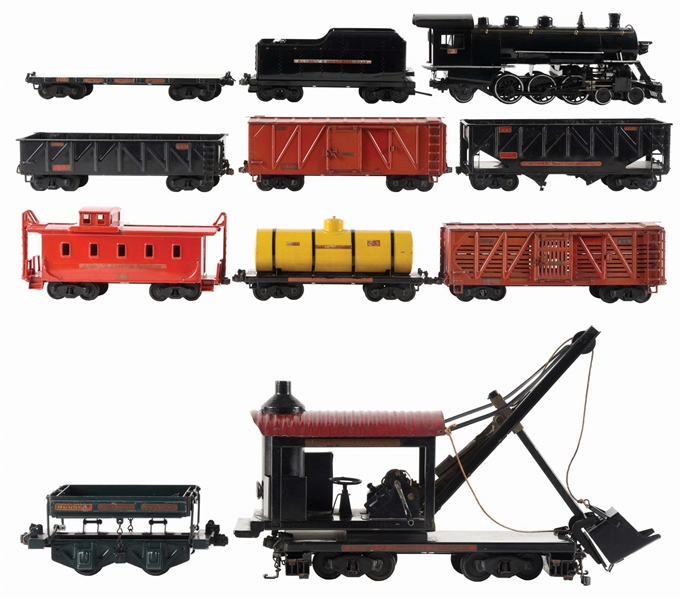 LOT OF 12: 11 BUDDY "L" PRESSED STEEL OUTDOOR ENGINE, TENDER & CARS W/ 3 ADDITIONAL STRAIGHT TRACK SECTIONS