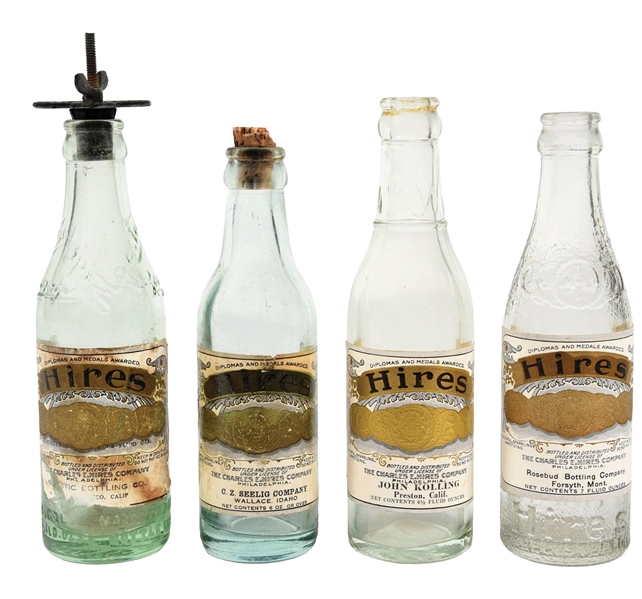 COLLECTION OF 4 HIRES ROOT BEER BOTTLES