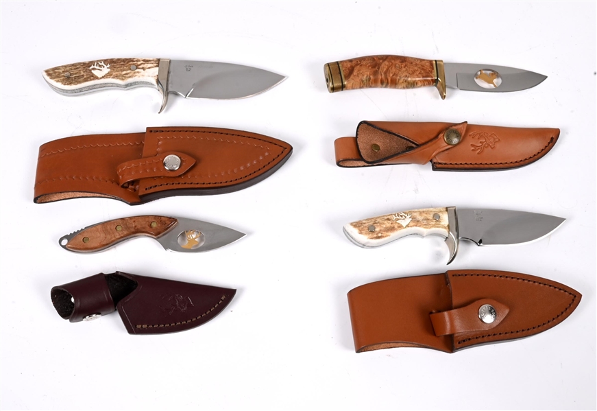 LOT OF 4: LIMITED EDITION BUCK KNIVES.