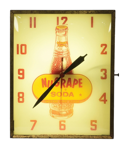 NUGRAPE SODA POP LIGHT-UP CLOCK W/ BOTTLE GRAPHIC. 