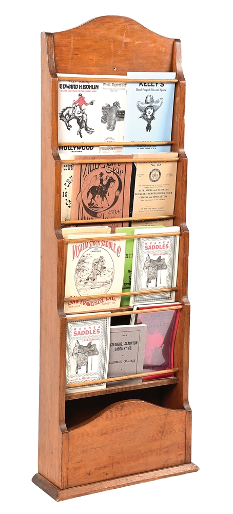 WOODEN RACK WITH VARIOUS SADDLE CATALOGS