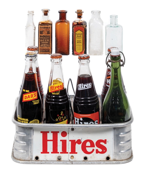 METAL HIRES CRATE OF ASSORTED SODA AND SYRUP BOTTLES.