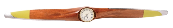 LARGE WOODEN AIRPLANE PROP WITH ADDED CLOCK INSERT. 