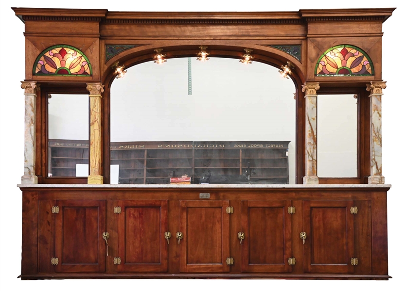 MAHOGANY BACK BAR WITH LIGHTED ARCHES AND MARBLE COLUMNS