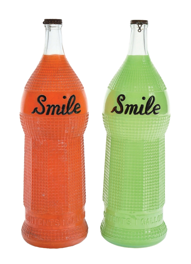 PAIR OF SMILE SYRUP BOTTLES