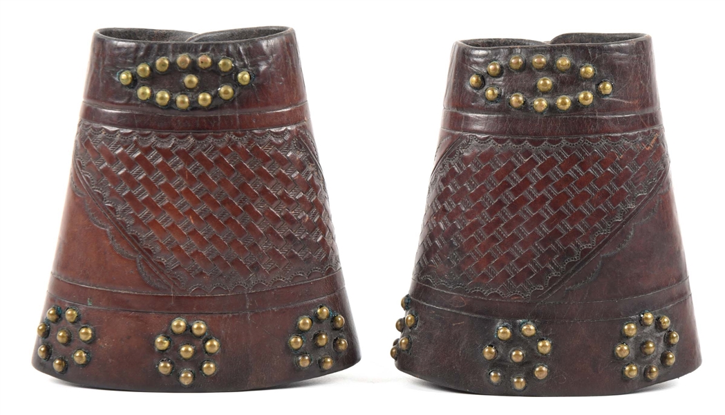 STUDDED LEATHER COWBOY CUFFS.