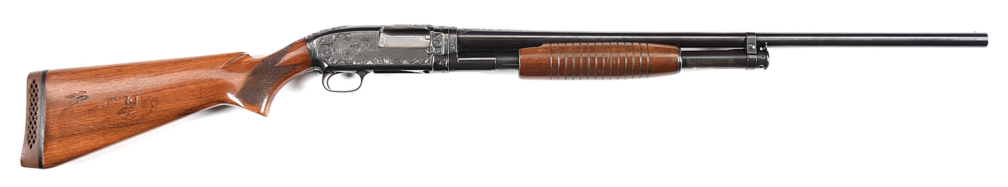 (C) ENGRAVED WINCHESTER MODEL 12 SLIDE ACTION SHOTGUN.