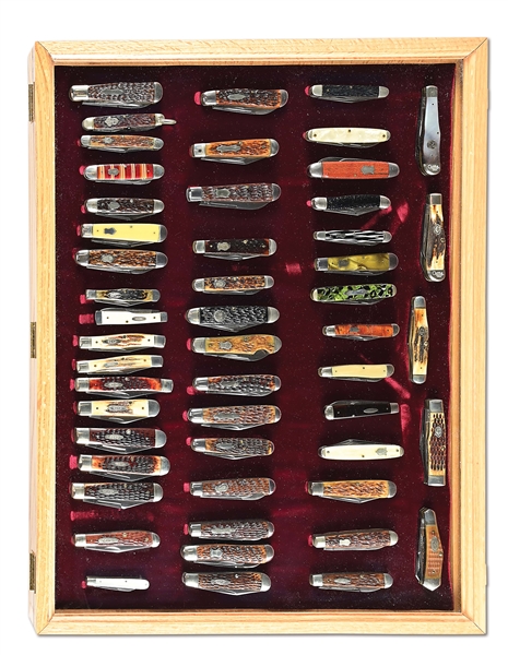 CASED COLLECTION OF 51 AMERICAN FOLDING KNIVES.