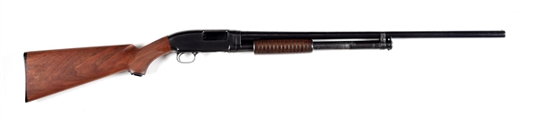 (C) WINCHESTER MODEL 12 SLIDE ACTION SHOTGUN.