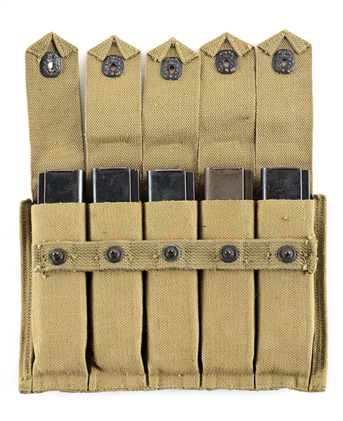 FIVE SOUGHT AFTER HARRINGTON AND RICHARDSON REISNG MODEL 50 MACHINE GUN MAGAZINES IN ORIGINAL 5-CELL CARRIER.