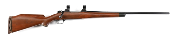 (C) WINCHESTER MODEL 70 BOLT ACTION SPORTING RIFLE IN .300 WINCHESTER MAGNUM.