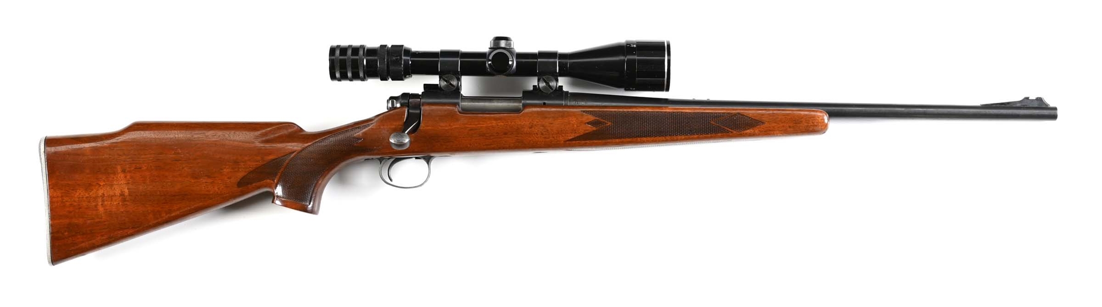 (C) FIRST YEAR REMINGTON 700 ADL BOLT ACTION RIFLE.