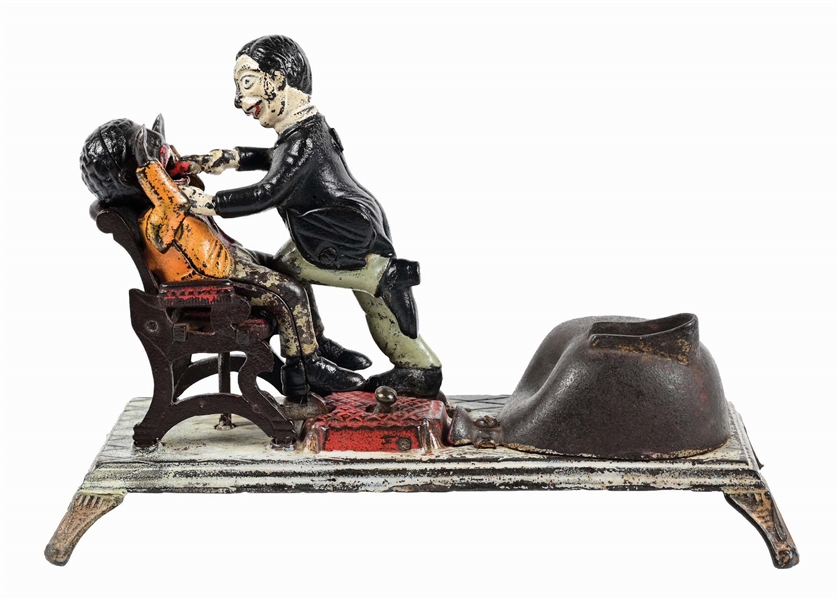 J. & E. STEVENS DENTIST CAST IRON MECHANICAL BANK 