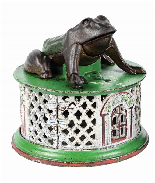 J. & E. STEVENS FROG ON ROUND BASE CAST IRON MECHANICAL BANK