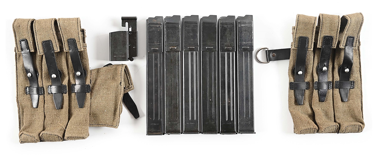 LOT OF SIX HIGH CONDITION ORIGINAL WW2 GERMAN MARKED MP-40 MACHINE GUN MAGAZINES WITH ORIGINAL LOADER AND SET OF REPRODUCTION MAGAZINE POUCHES. 