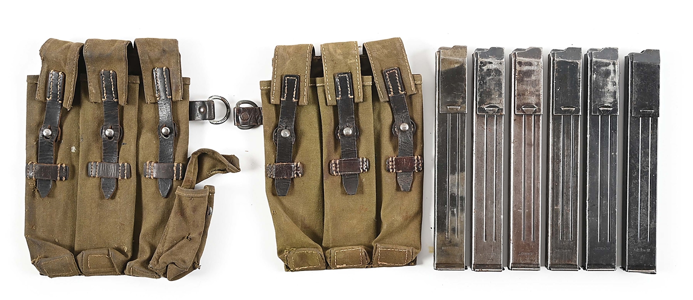 PAIR OF SEASONED GERMAN MARKED MP-40 MACHINE GUN MAGAZINE POUCHES WITH 6 ORIGINAL MAGAZINES. 