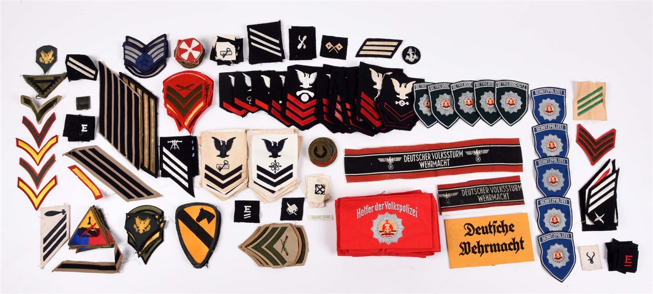 LOT OF THIRD REICH ARMBANDS, EAST GERMAN INSIGNIA, AND US INSIGNIA.