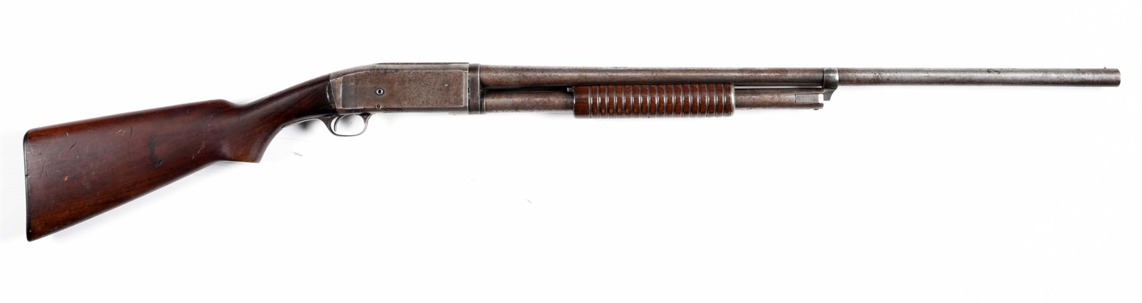 (C) REMINGTON MODEL 10 SLIDE ACTION SHOTGUN.