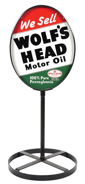 WOLFS HEAD MOTOR OIL TIN CURB SIGN.