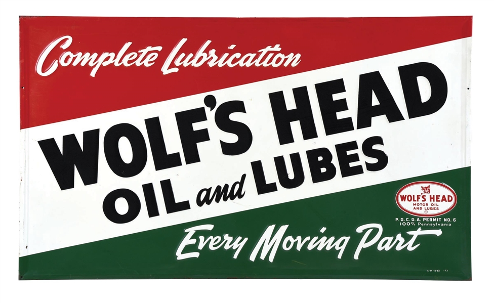 WOLFS HEAD OIL AND LUBED SELF FRAMED EMBOSSED TIN SIGN W/ WOOD BACKING.