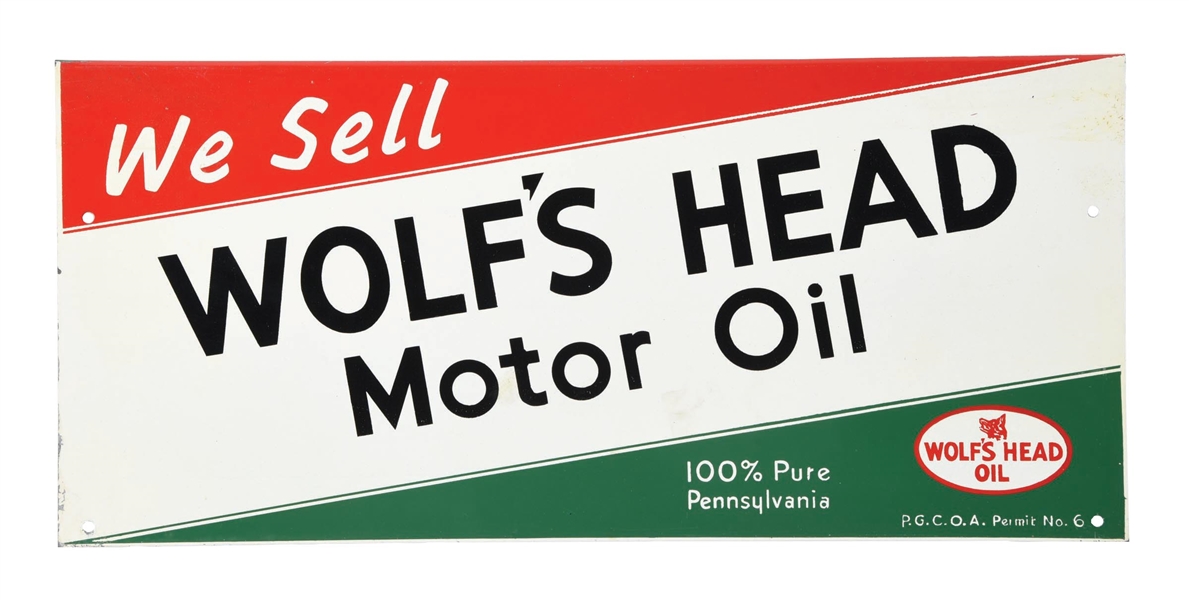 WE SELL WOLFS HEAD MOTOR OIL TIN OIL RACK SIGN. 