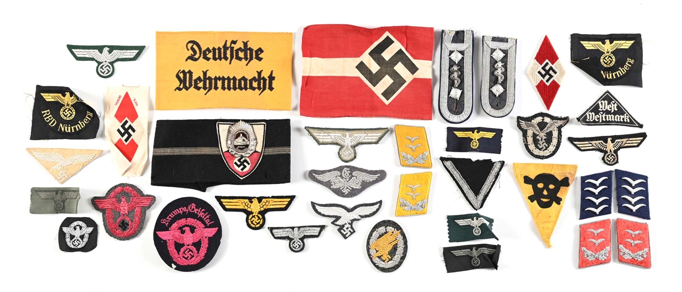 LOT OF MISCELLANEOUS THIRD REICH ARMBANDS & INSIGNIA.