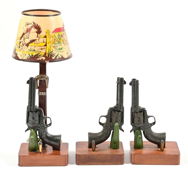 LOT OF 3: IMITATION REVOLVER AND CACTUS LAMP AND BOOKENDS.